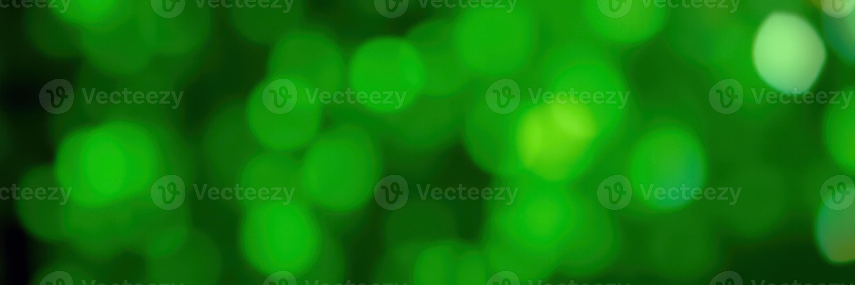 Vibrant green bokeh background creating a soothing atmosphere for various creative projects photo
