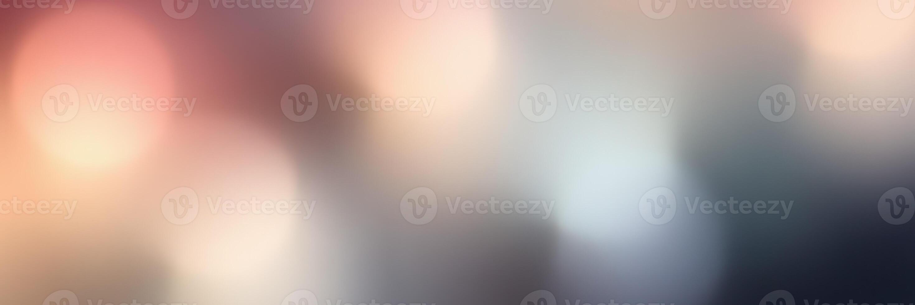 Soft, blurred background of colorful lights with a warm ambiance during evening hours photo