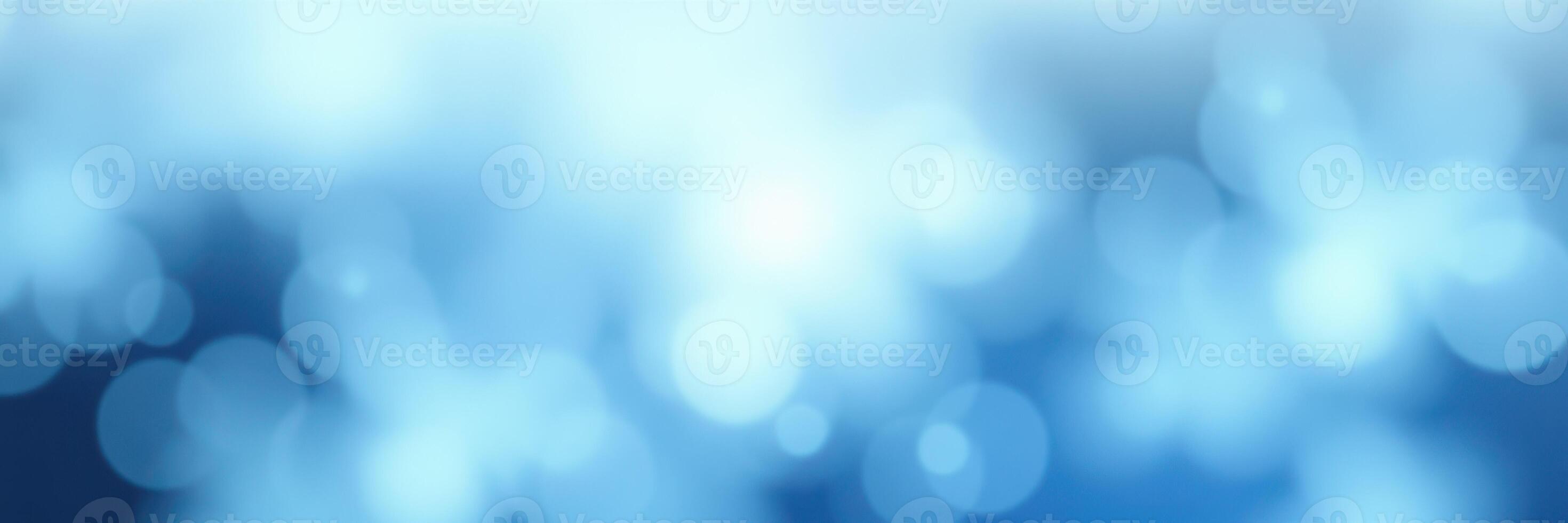 Soft blue bokeh background creates a calming atmosphere for creative projects and designs photo