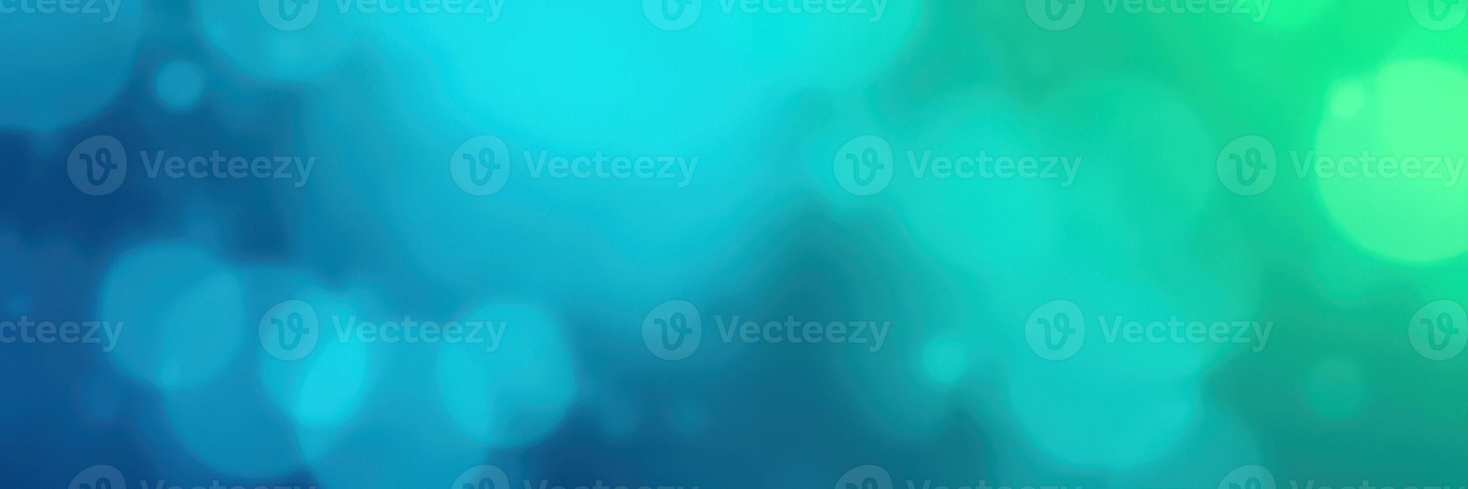 Colorful abstract background with gradient shades of blue and green creating a calming atmosphere photo
