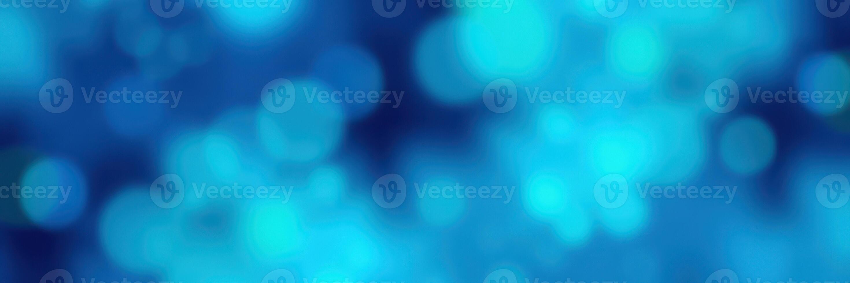 Vivid blue bokeh background creates a serene atmosphere perfect for creative projects and digital design purposes photo