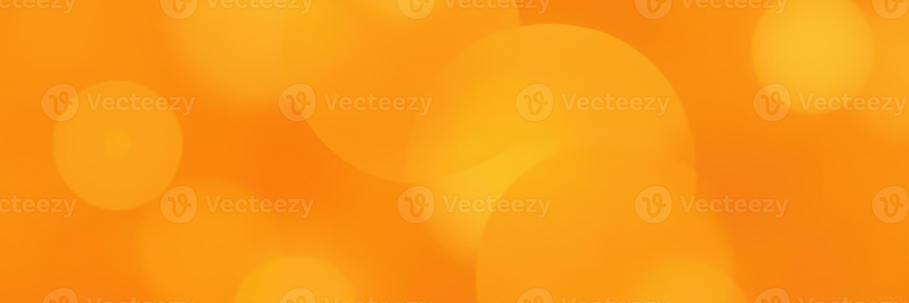 Vibrant orange background with soft glowing circles creates a warm and inviting atmosphere for various creative uses photo