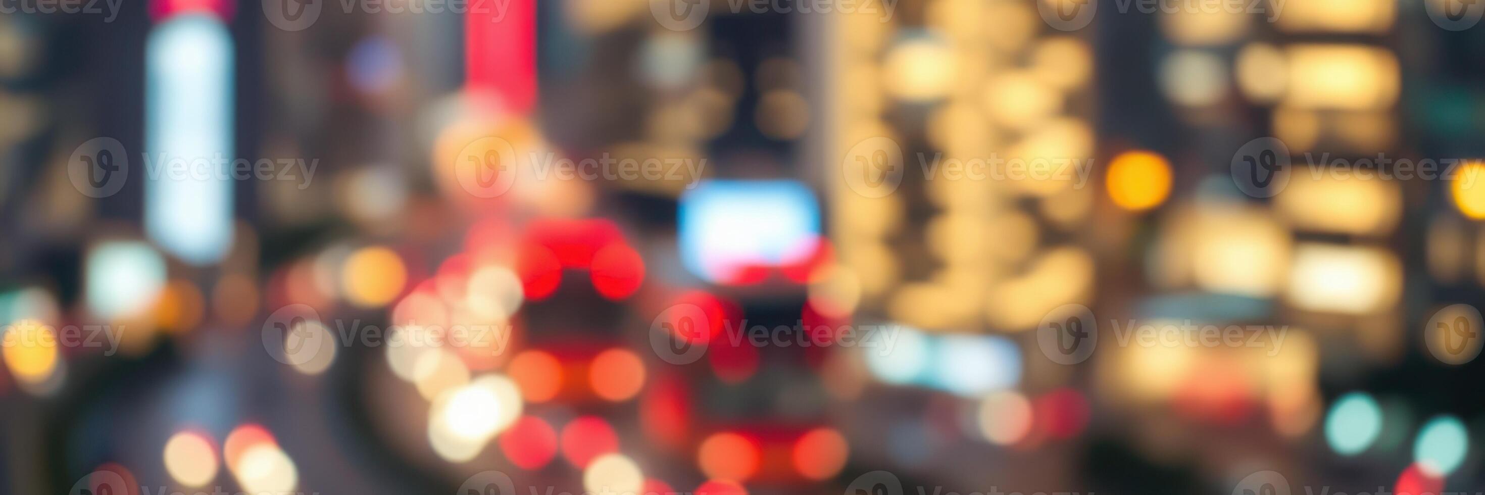 Vibrant city lights create a dynamic night atmosphere in a busy urban area photo