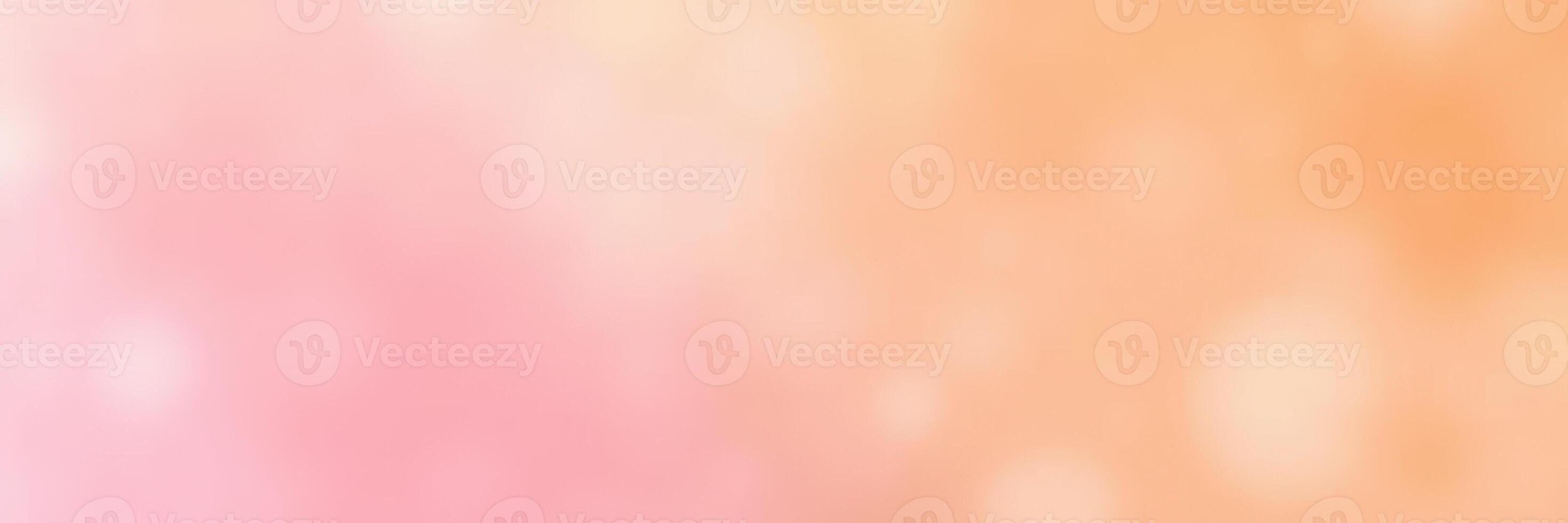 Soft gradient background blending shades of pink and orange creates a warm and inviting atmosphere for design projects photo