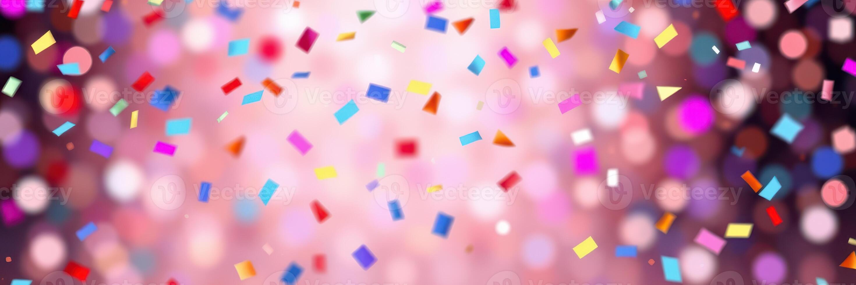 Colorful confetti falling during a festive celebration with sparkling lights in the background photo