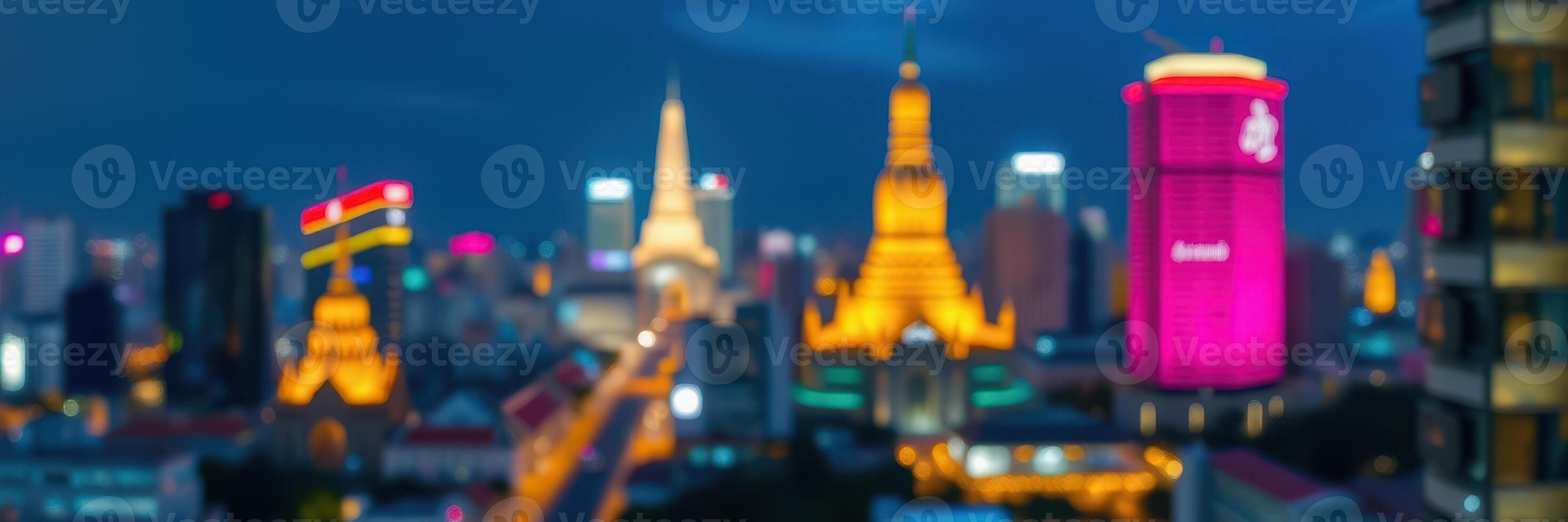 View of illuminated city skyline at dusk with historic temples and modern buildings in Bangkok, Thailand photo