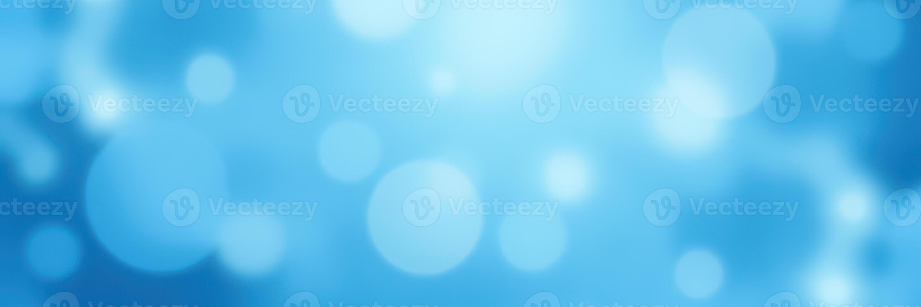 Beautiful blue background with soft bokeh effect creating a serene atmosphere in a bright setting photo