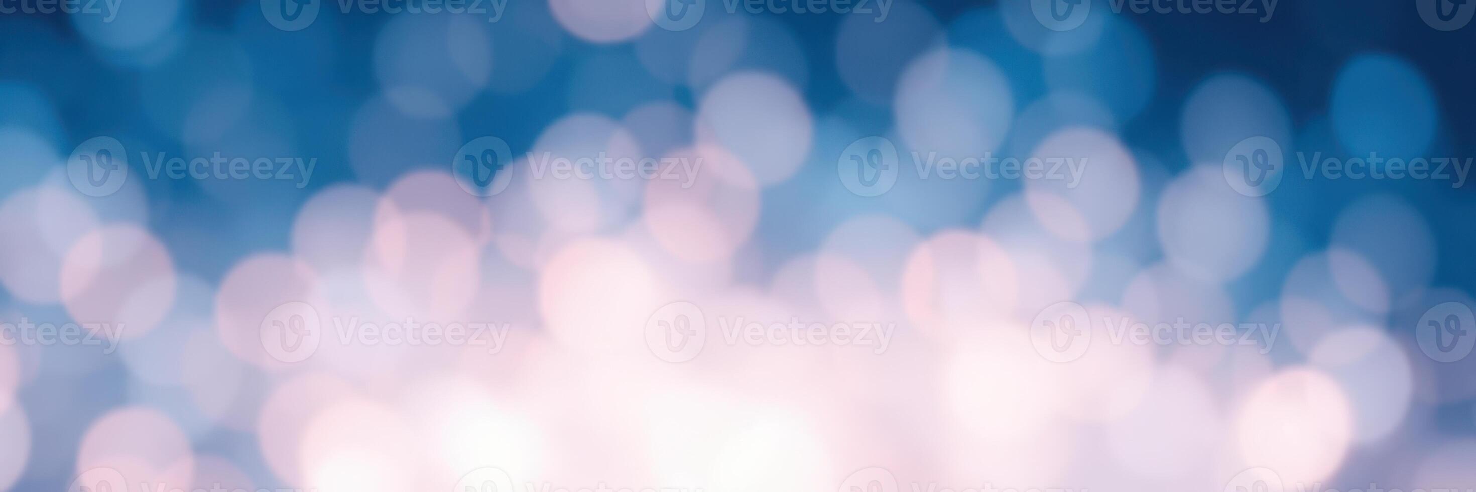 Soft bokeh lights create a dreamy atmosphere in a tranquil blue setting during a serene evening photo