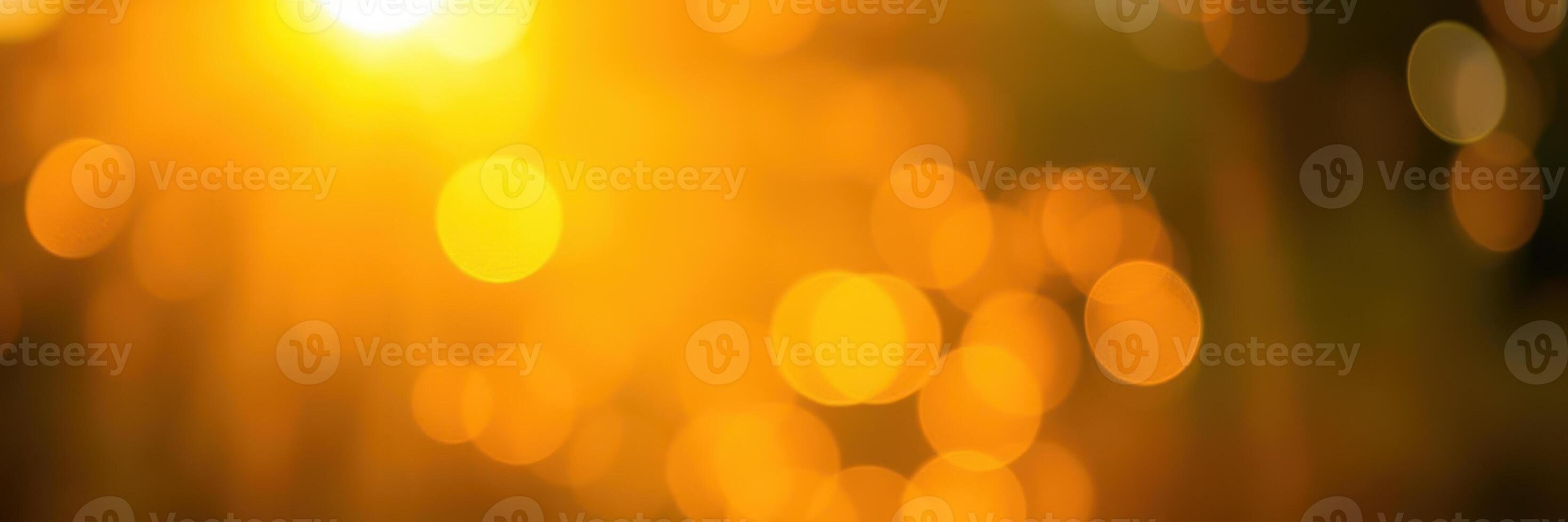 Shimmering golden bokeh creates a warm atmosphere during sunset outdoors photo