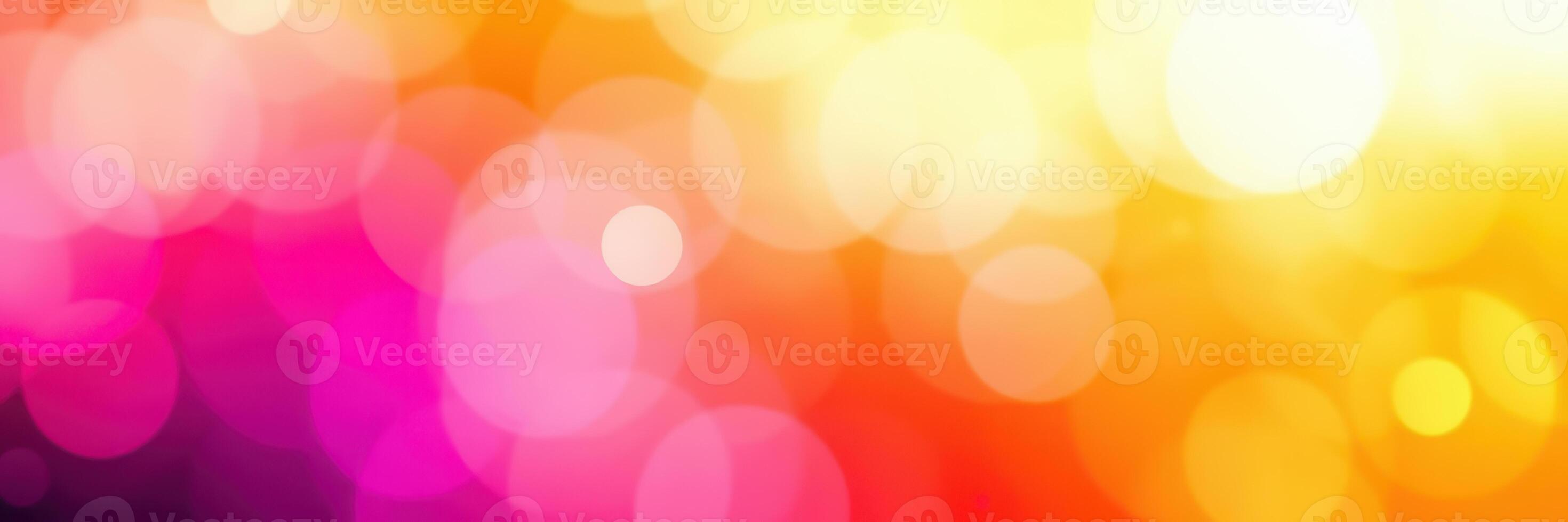 Colorful bokeh lights create a vibrant atmosphere at a festive event in the evening photo