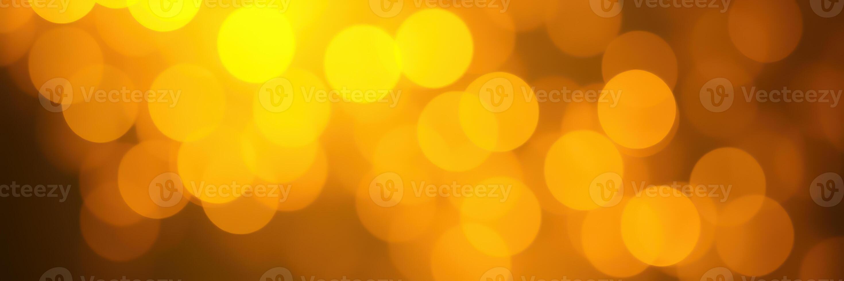 Bright golden bokeh lights create a warm and festive atmosphere for celebrations and gatherings in the evening photo