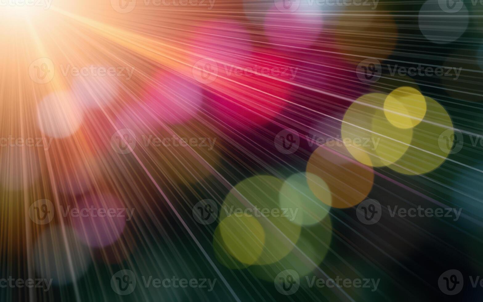 Colorful bokeh lights create a magical atmosphere during a sunny afternoon in a serene garden photo