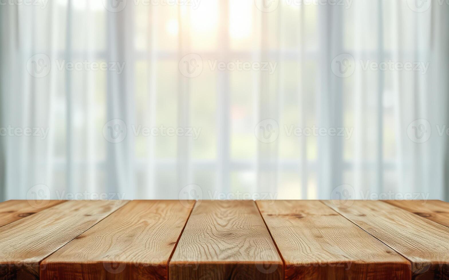 Wooden table with soft light filtering through sheer curtains in a cozy interior setting photo