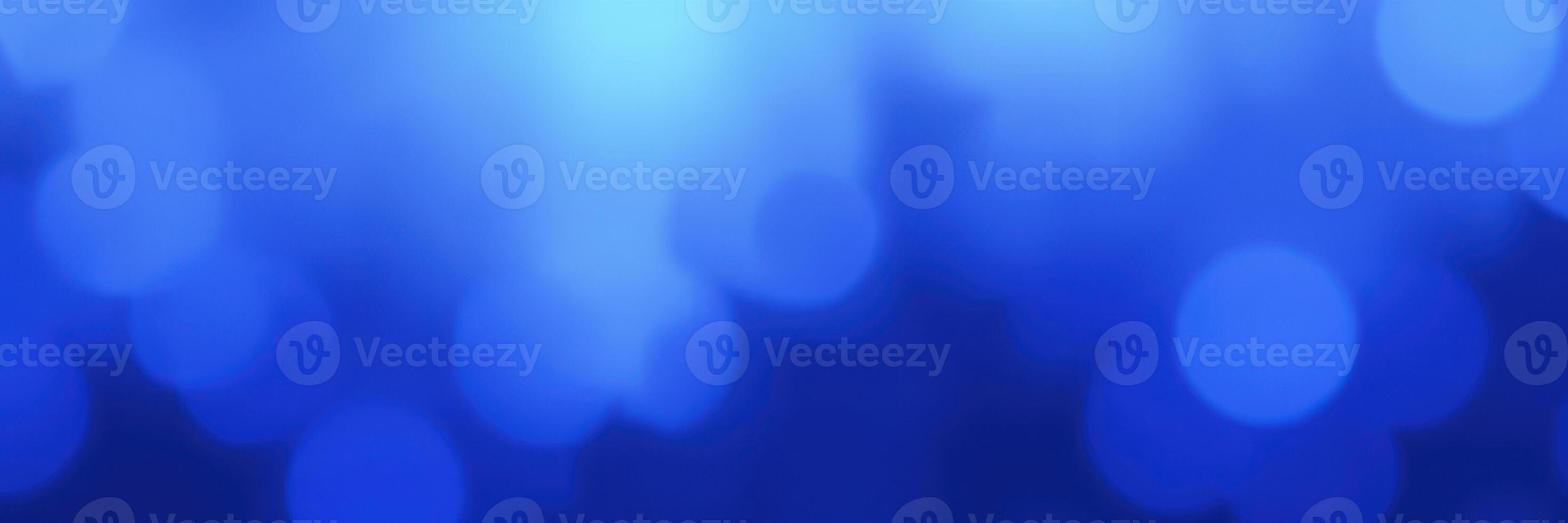 Soft blue bokeh background creates an ethereal atmosphere perfect for artistic designs and creative projects photo