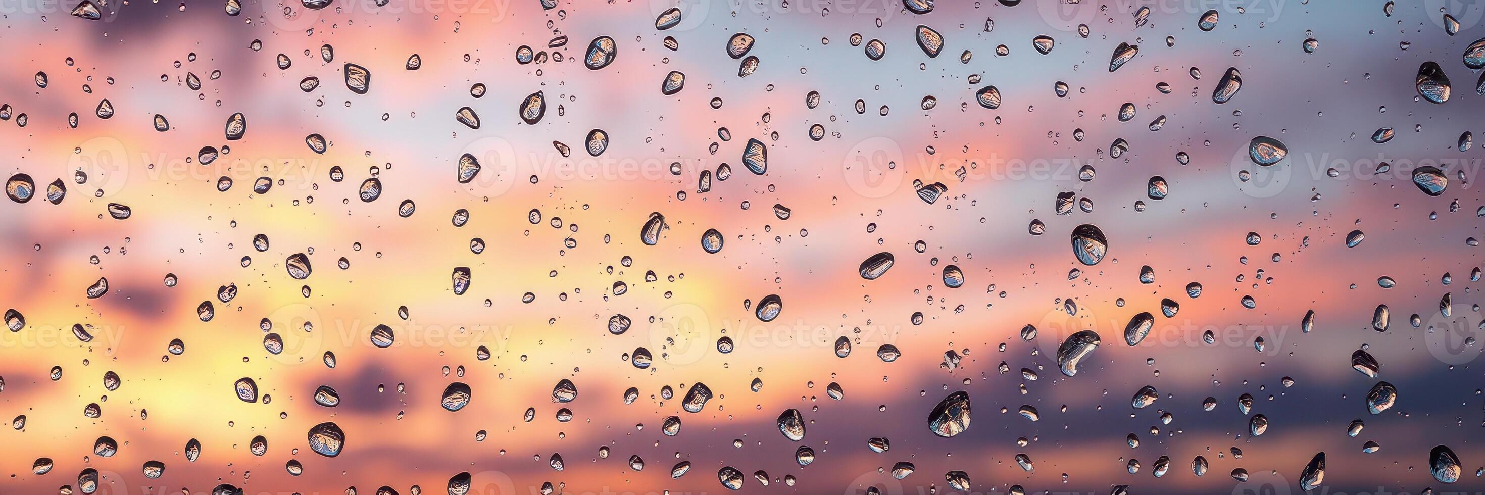 Beautiful sunset with raindrops on window creating a serene atmosphere photo