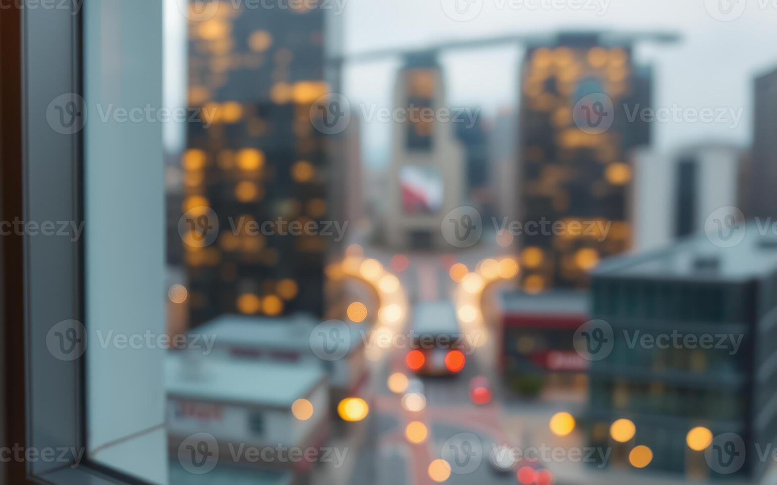 City skyline at dusk with illuminated buildings and blurred lights creating a vibrant urban atmosphere photo