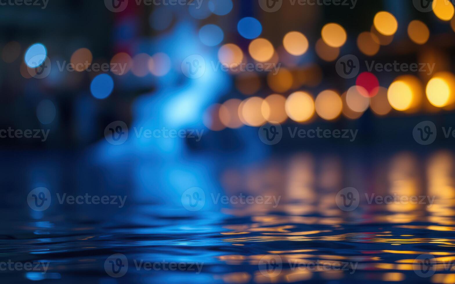 Nighttime reflections on water surface illuminated by distant lights creating a serene atmosphere photo