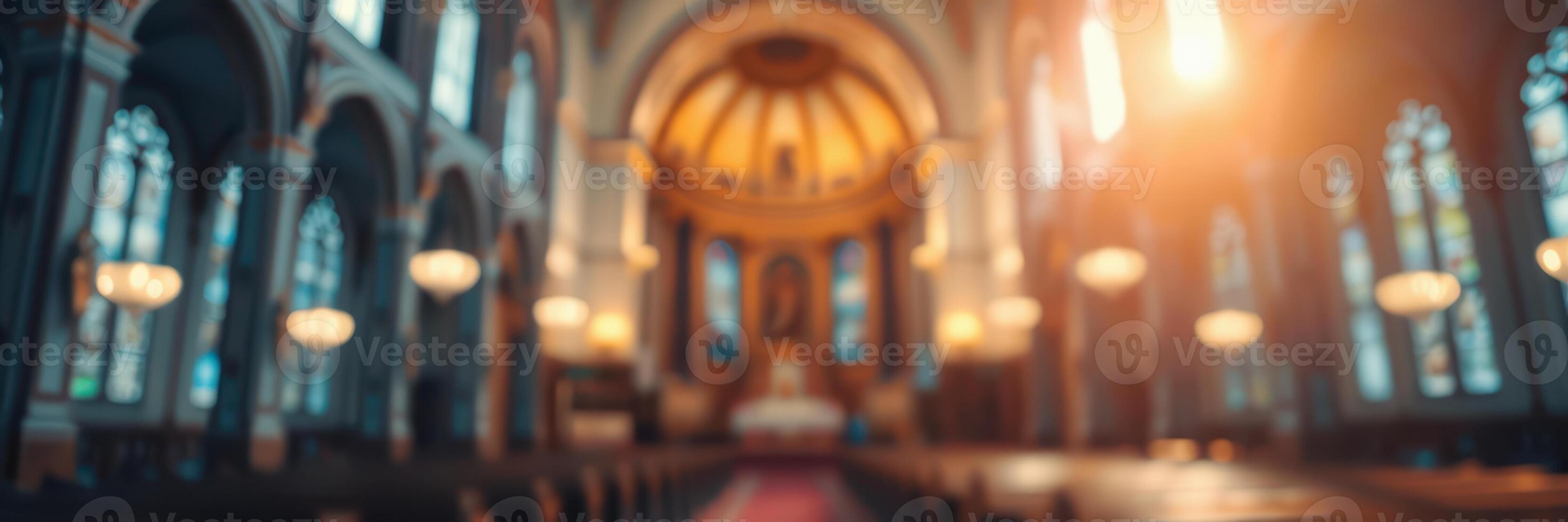 Interior of an ornate church with a warm glow from overhead lights during a quiet moment of contemplation photo