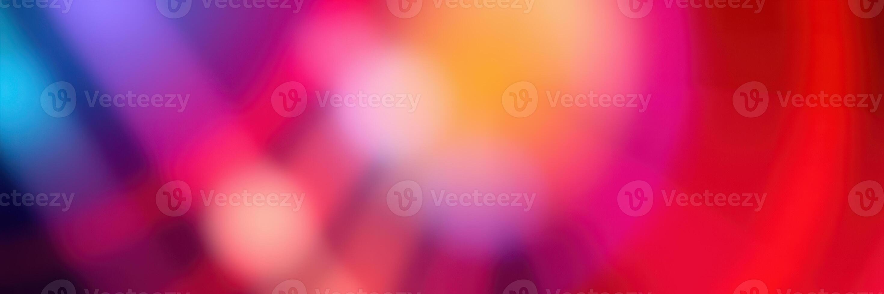 Colorful abstract light patterns create a vibrant atmosphere during a night event in an urban setting photo