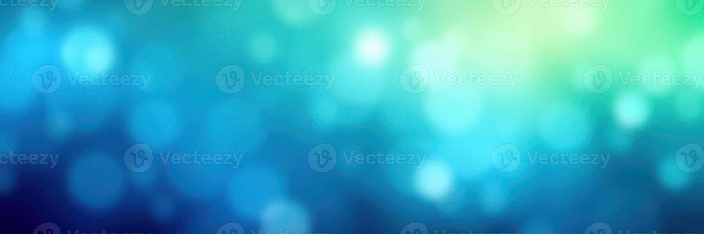 Abstract blue and green bokeh background with soft light effects for creative design projects photo
