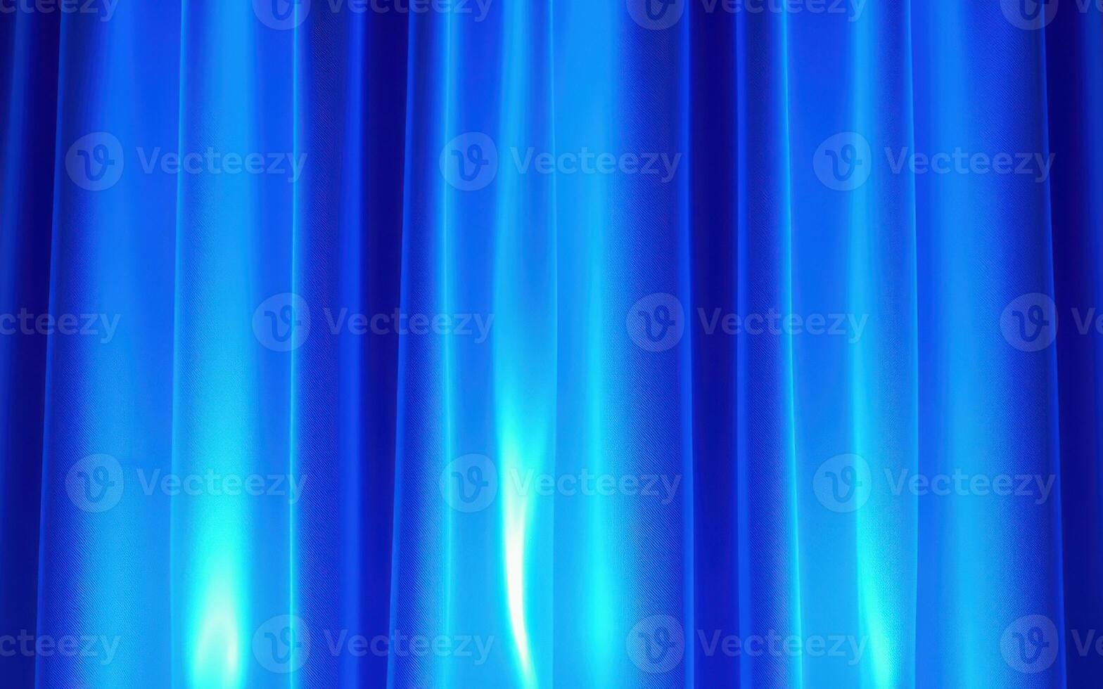 Elegant blue curtain backdrop creating a serene atmosphere for performances in a theater setting photo
