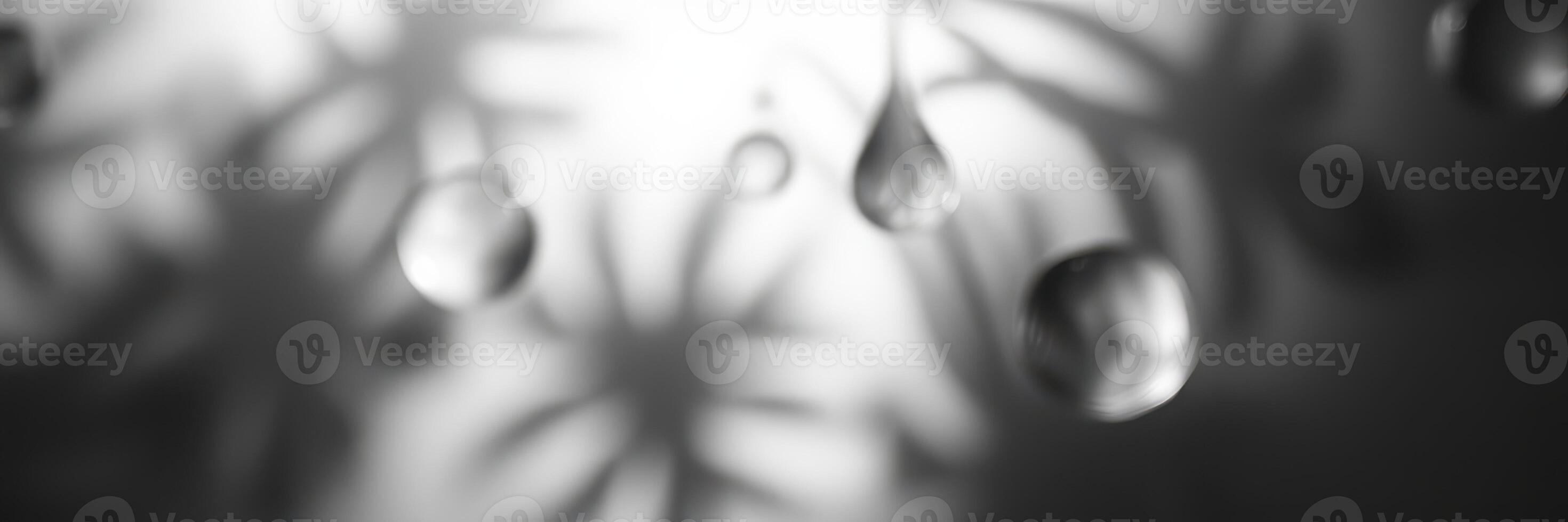 Abstract close-up of water droplets creating intricate shadows and patterns on a textured surface during soft lighting photo
