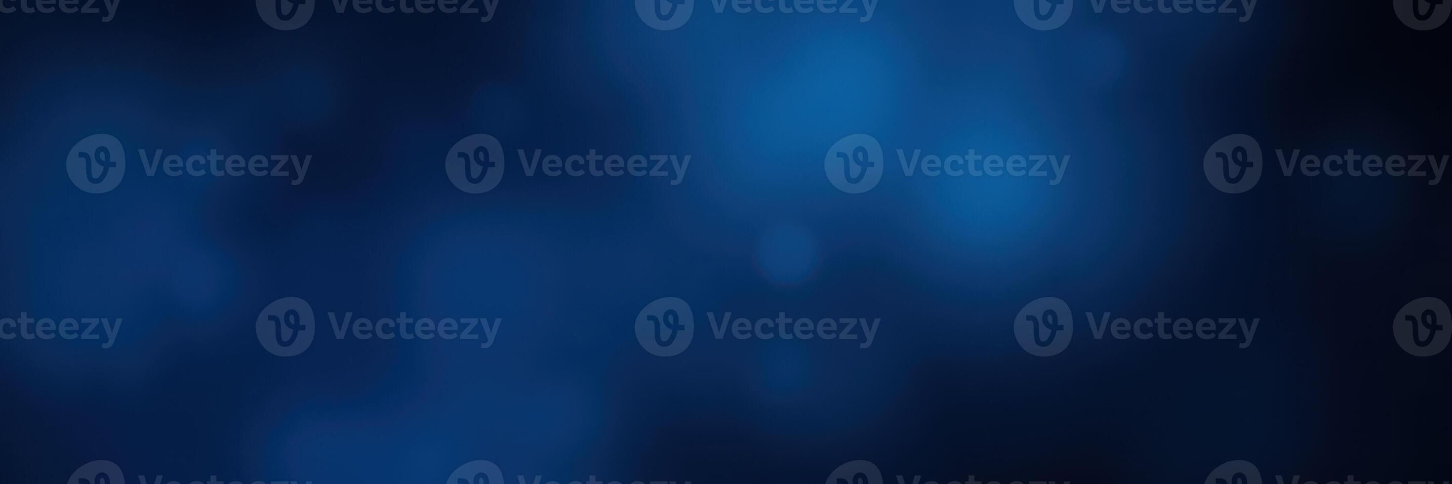 Dark blue background with smooth light patterns creating a calming atmosphere for relaxation and focus photo