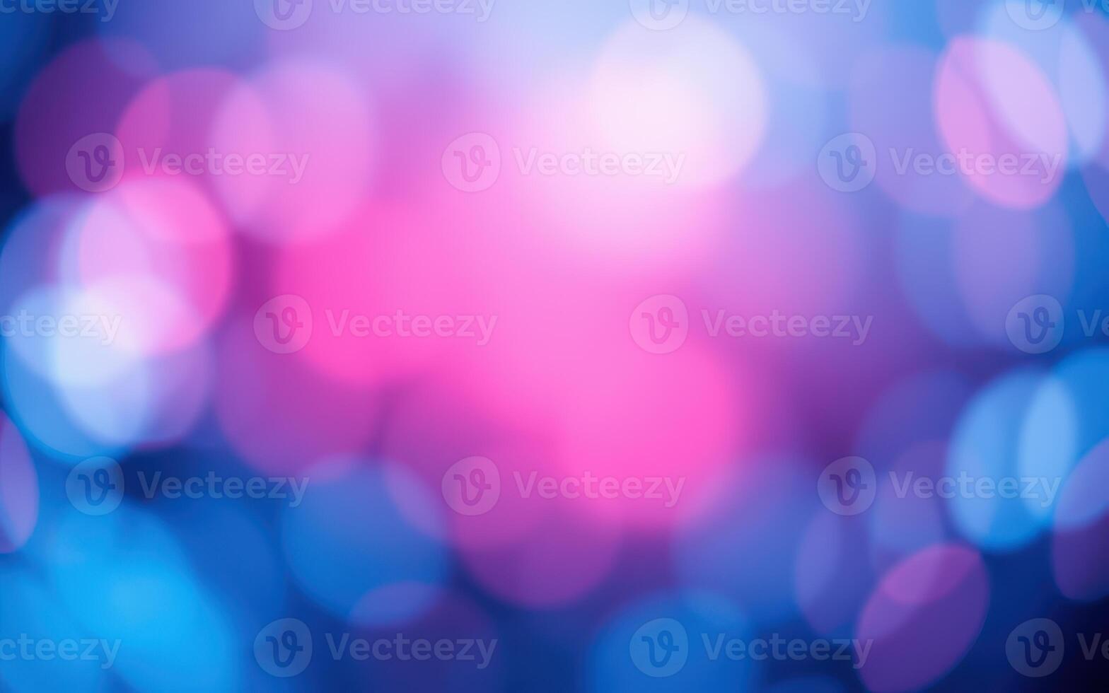 Colorful abstract background with vibrant pink and blue bokeh lights in a dreamy blur photo