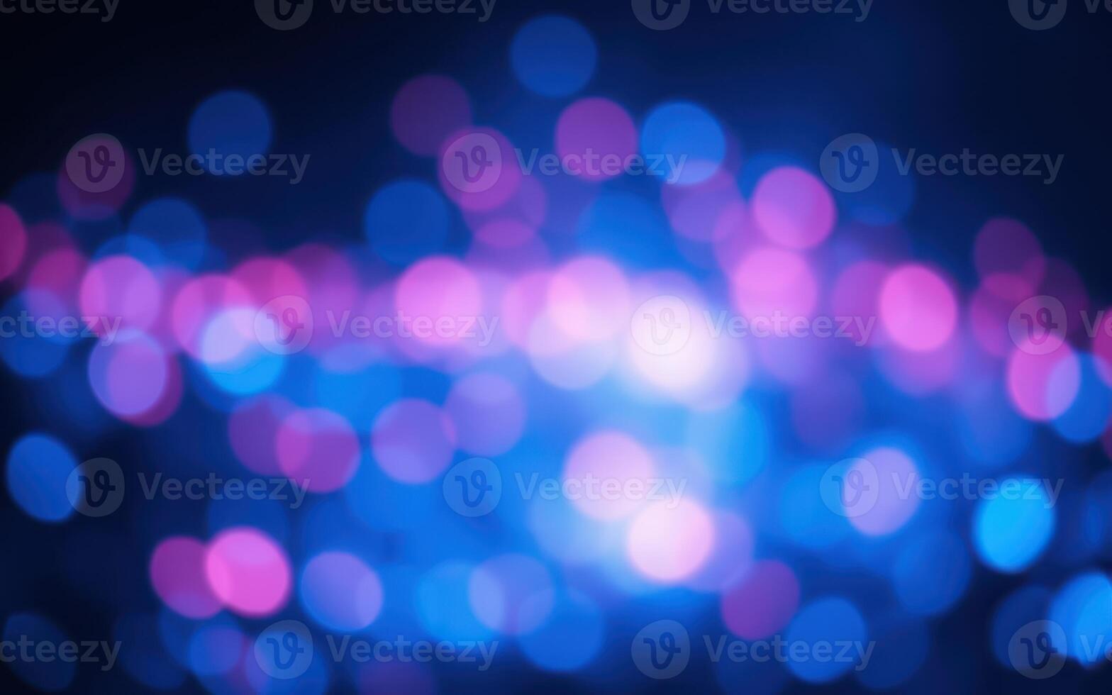 Vibrant abstract light display with blue and pink hues creating a dreamy atmosphere for artistic visuals photo