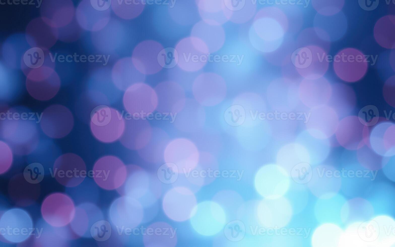 Colorful bokeh lights create a dreamy atmosphere in a nighttime setting with soft blue and purple tones photo