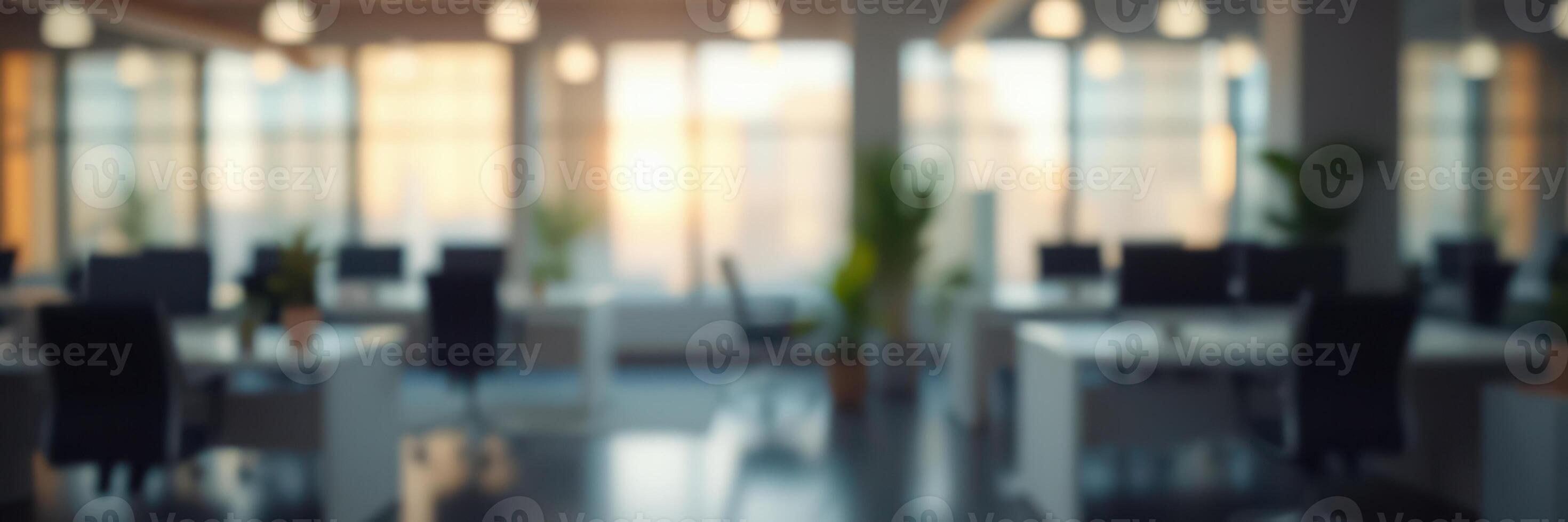 Modern office interior under soft lighting with blurred views of workspaces during the evening photo