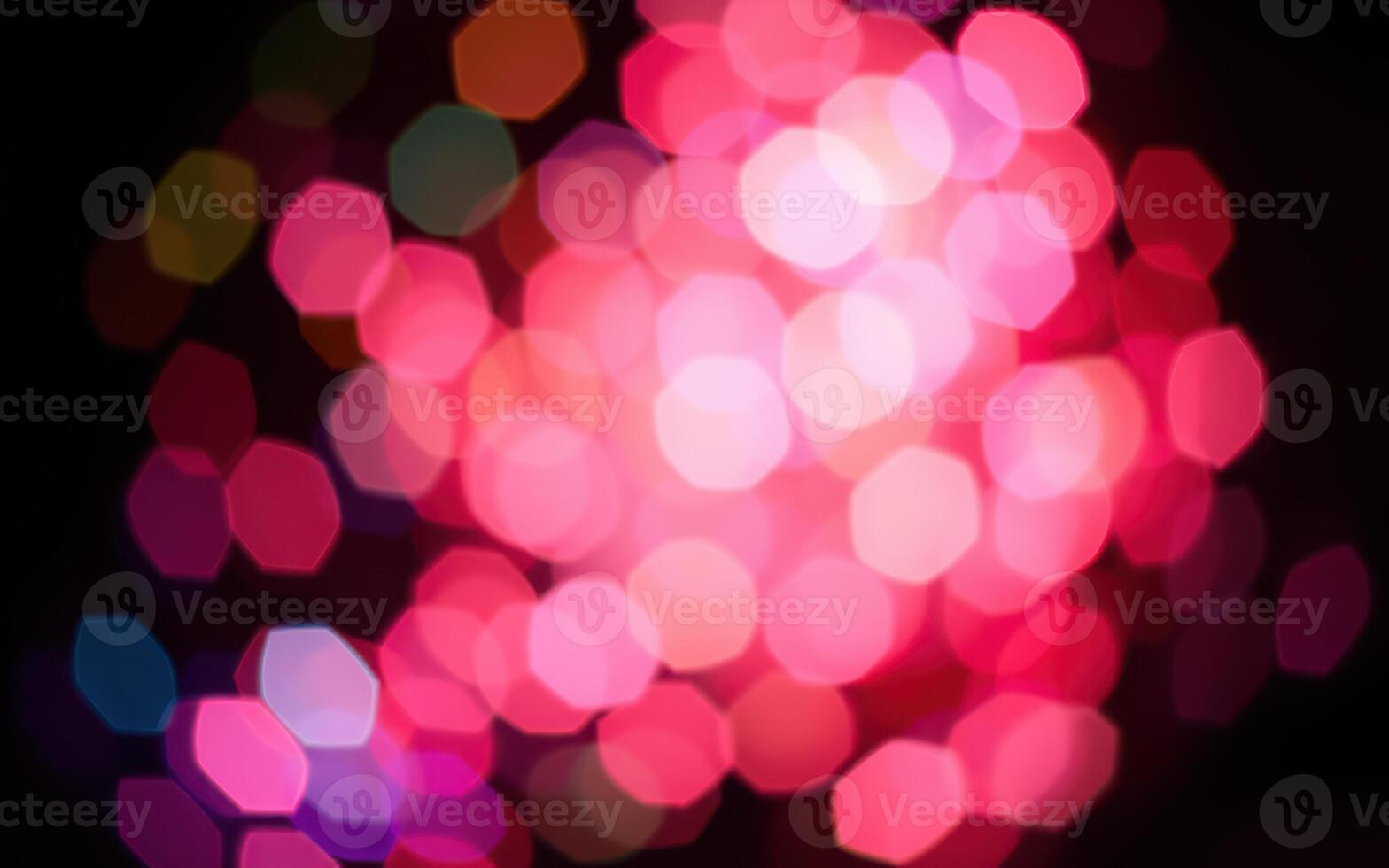 Vibrant display of colorful bokeh lights at a night festival, creating a festive atmosphere in the city square photo