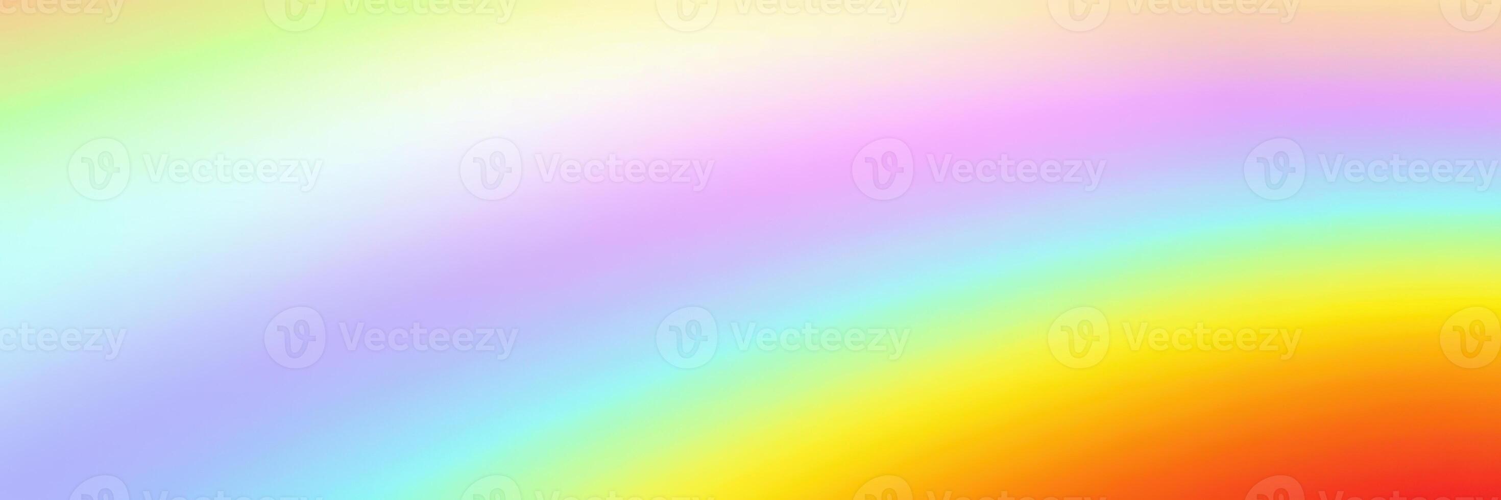 Colorful gradient background displaying a spectrum of hues from bright red to soft purple during daytime photo