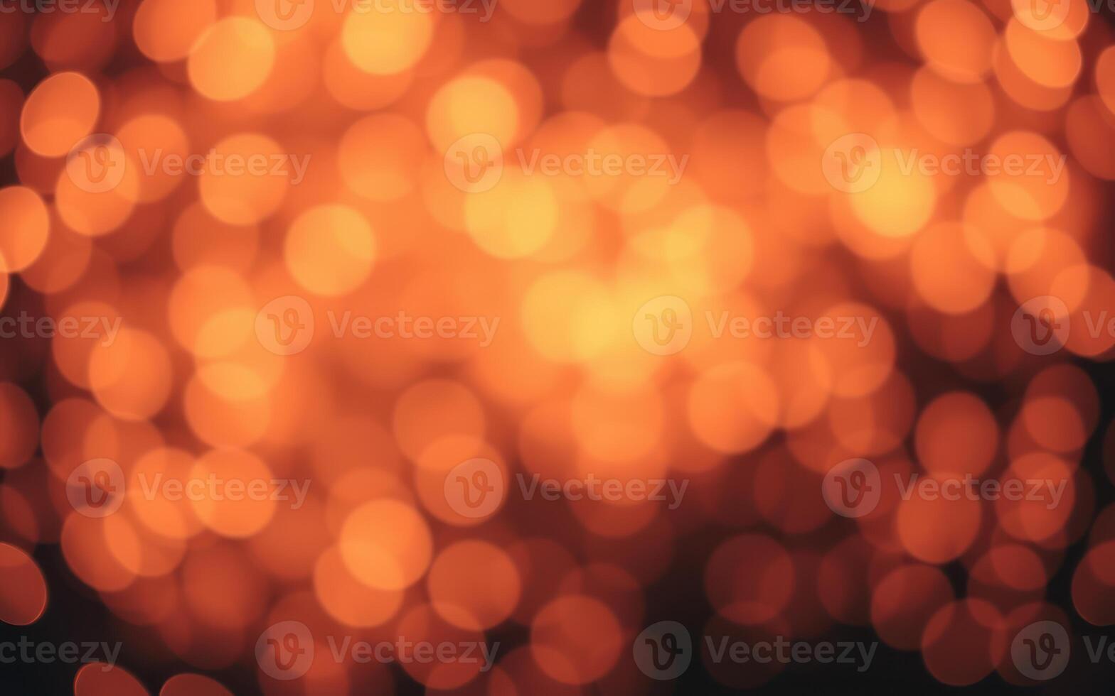 Warm orange and yellow glow illuminates a dark space during a fire or festive occasion photo
