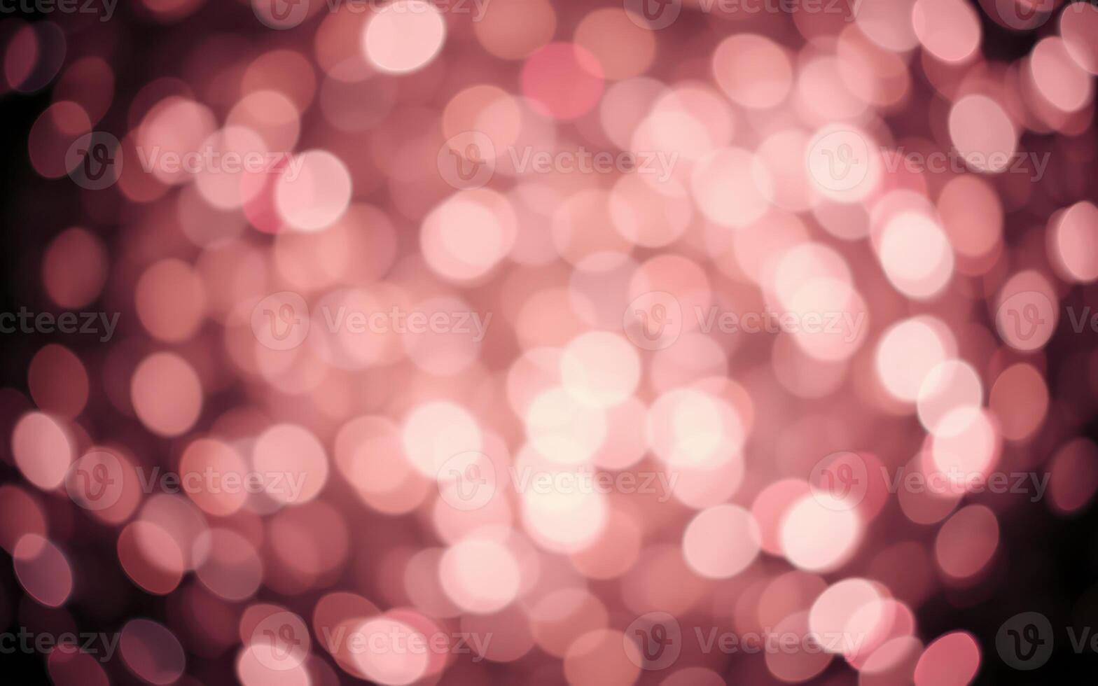 Soft pink bokeh lights create a dreamy atmosphere for celebrations and gatherings photo