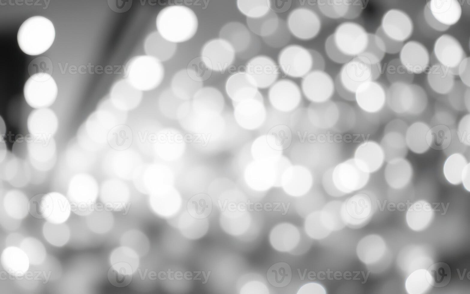 Bright out-of-focus lights create a soft and dreamy atmosphere during a festive evening celebration photo