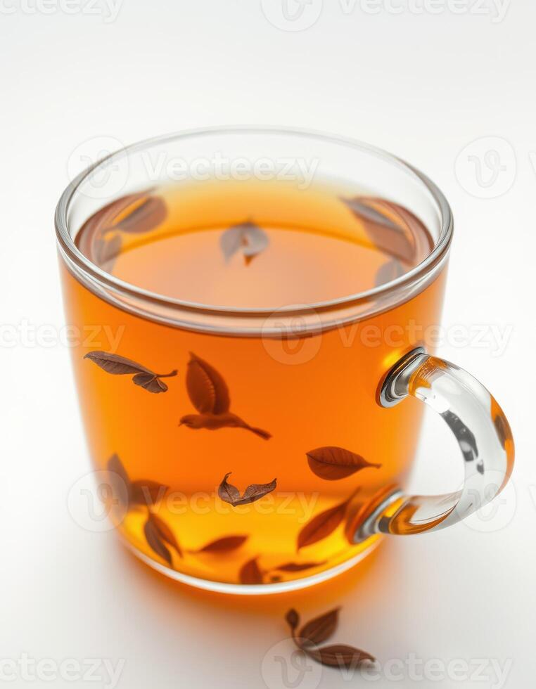 Freshly brewed herbal tea in clear glass mug with floating leaves showcasing a calming beverage experience photo