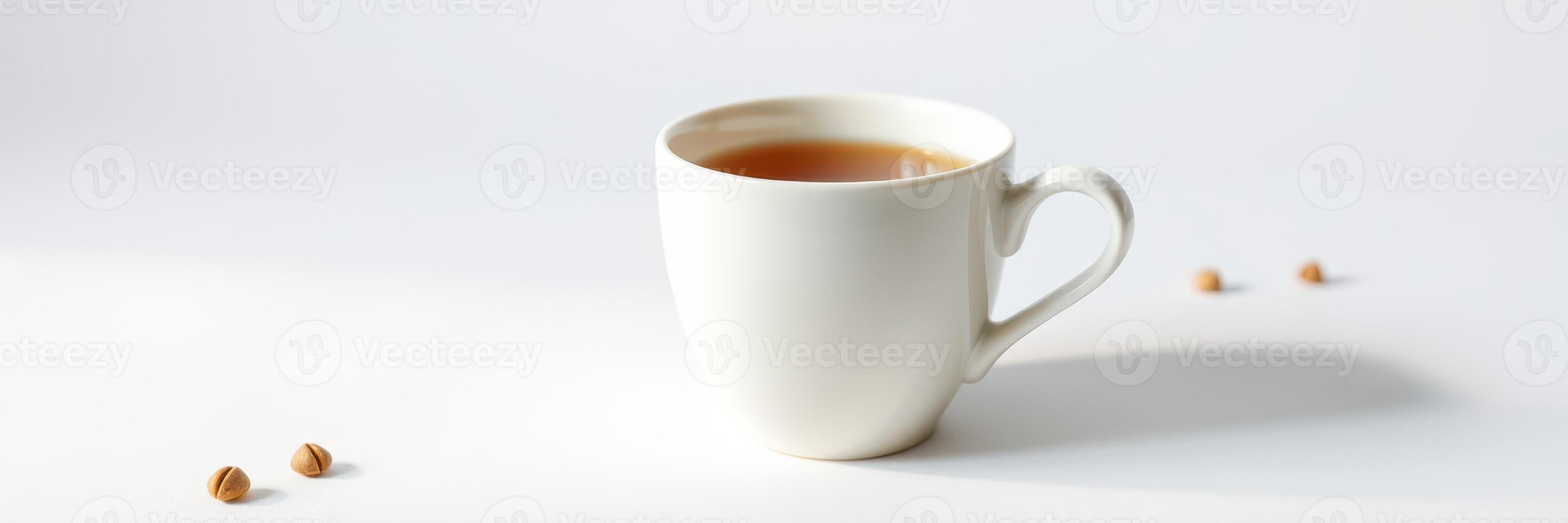 Warm cup of tea on a minimalist table with scattered tea leaves in a bright and serene setting photo