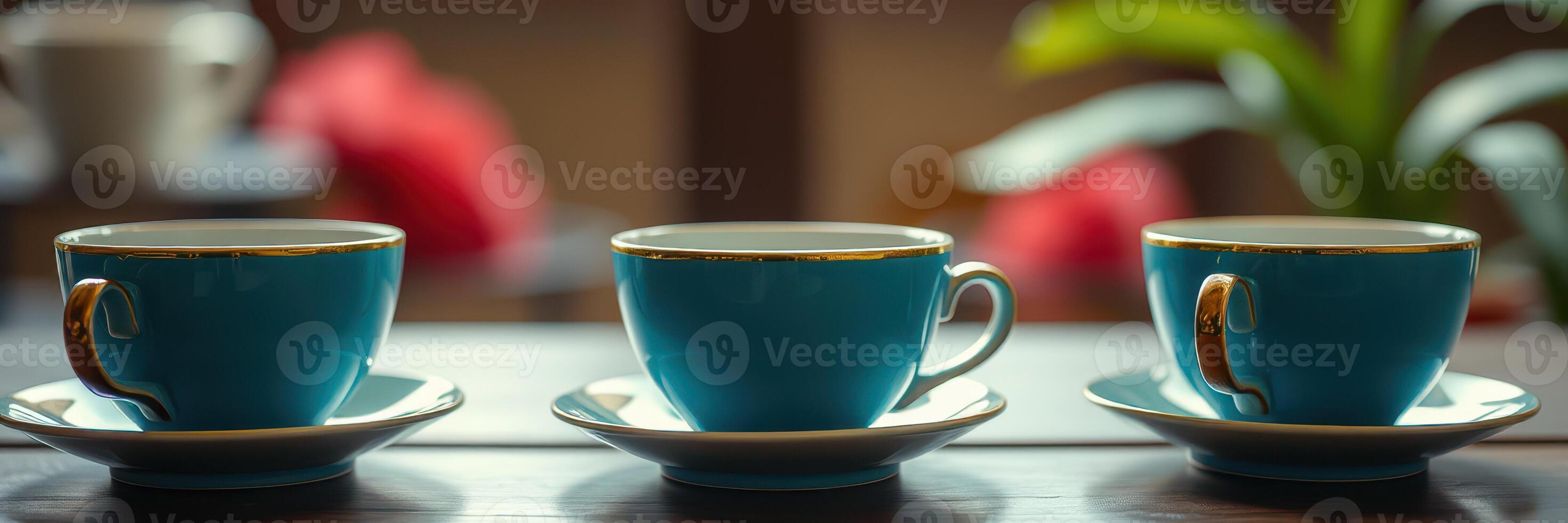 Exquisite collection of turquoise teacups displayed elegantly on a wooden table in a cozy cafe setting photo