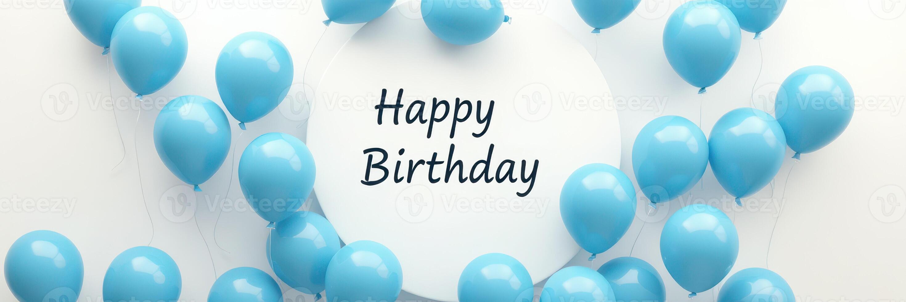Colorful blue balloons surround a white cake expressing joyful birthday wishes in a festive setting photo
