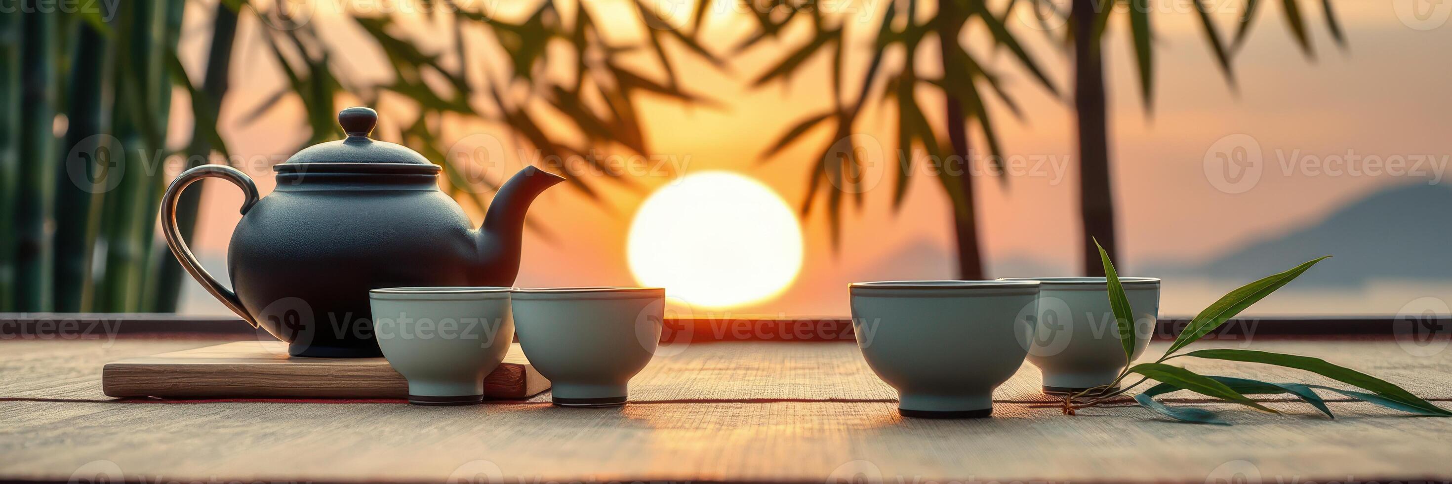 Relaxing tea time at sunset with bamboo and serene landscape in the background photo