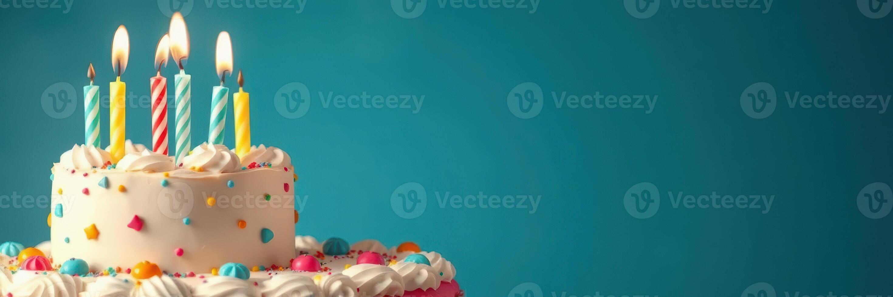 Colorful birthday cake with candles and decorations perfect for celebrations photo