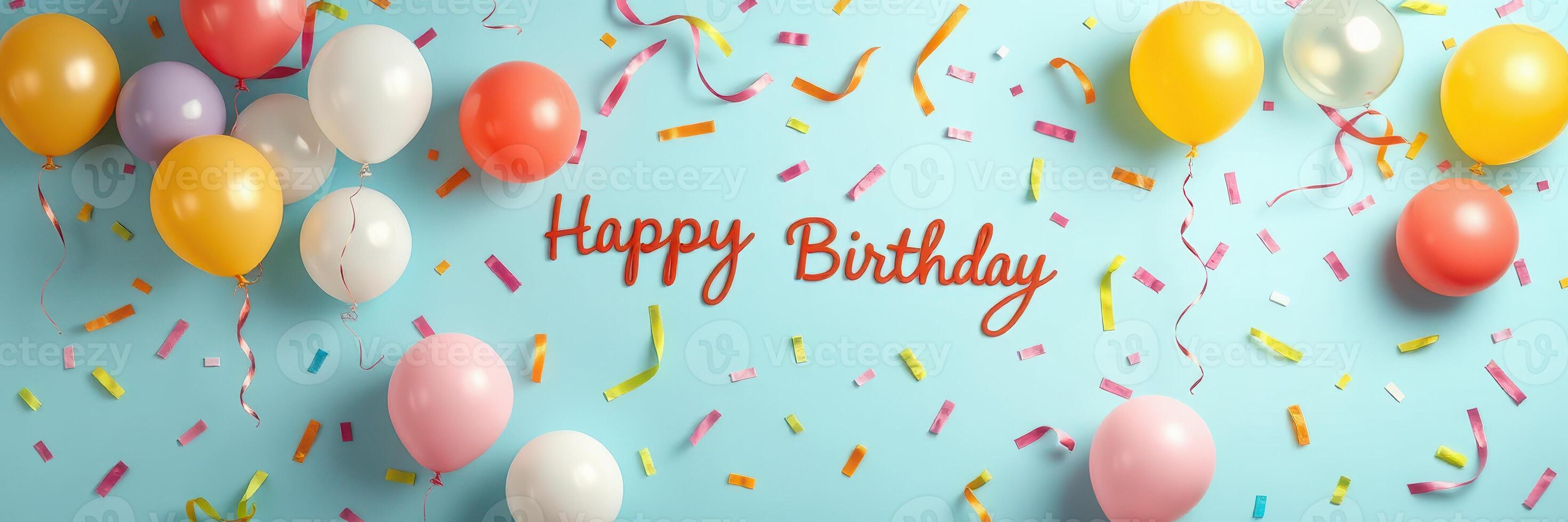 Colorful birthday celebration with balloons and confetti on a blue background photo