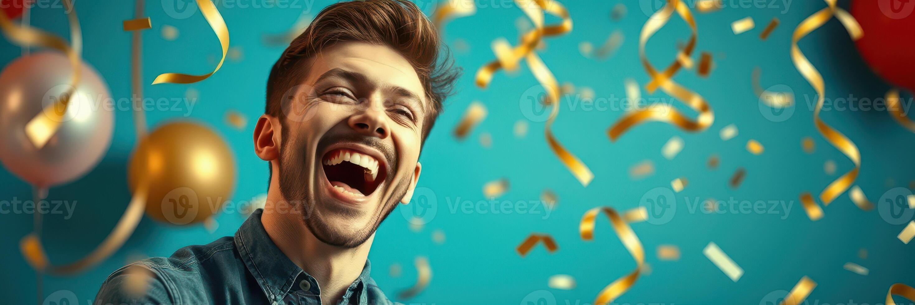 Man laughing joyfully under colorful confetti during a celebration with party decorations in the background photo