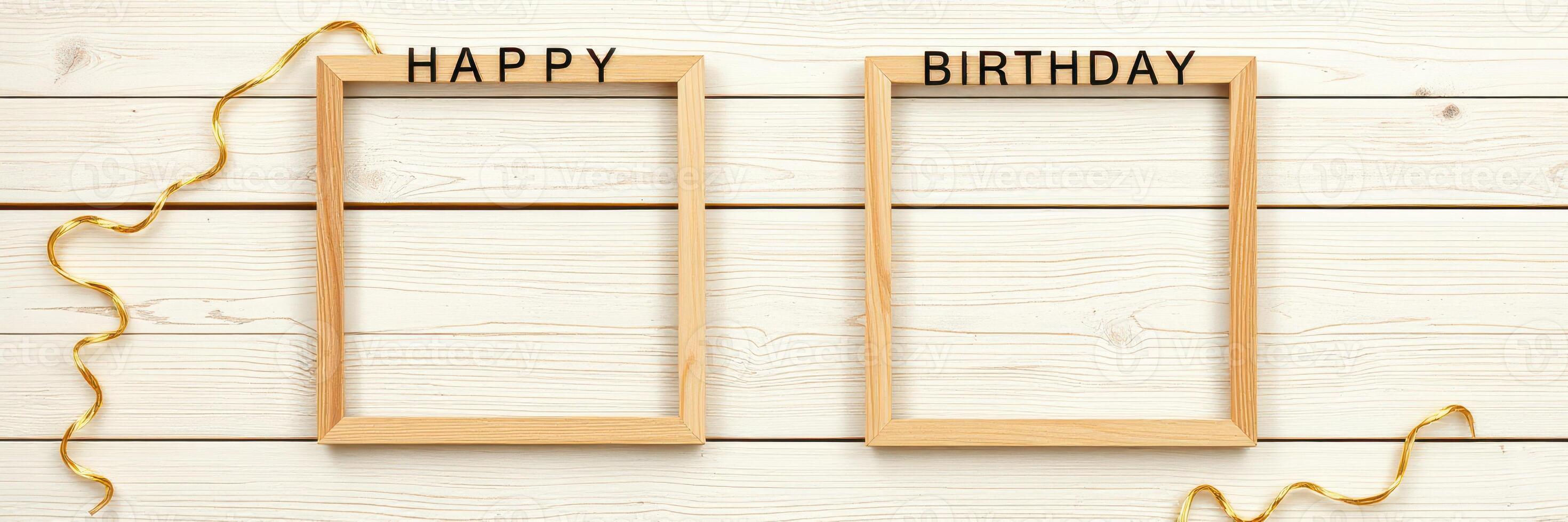 Decorative wooden frames with happy birthday text and golden ribbons for celebrations photo