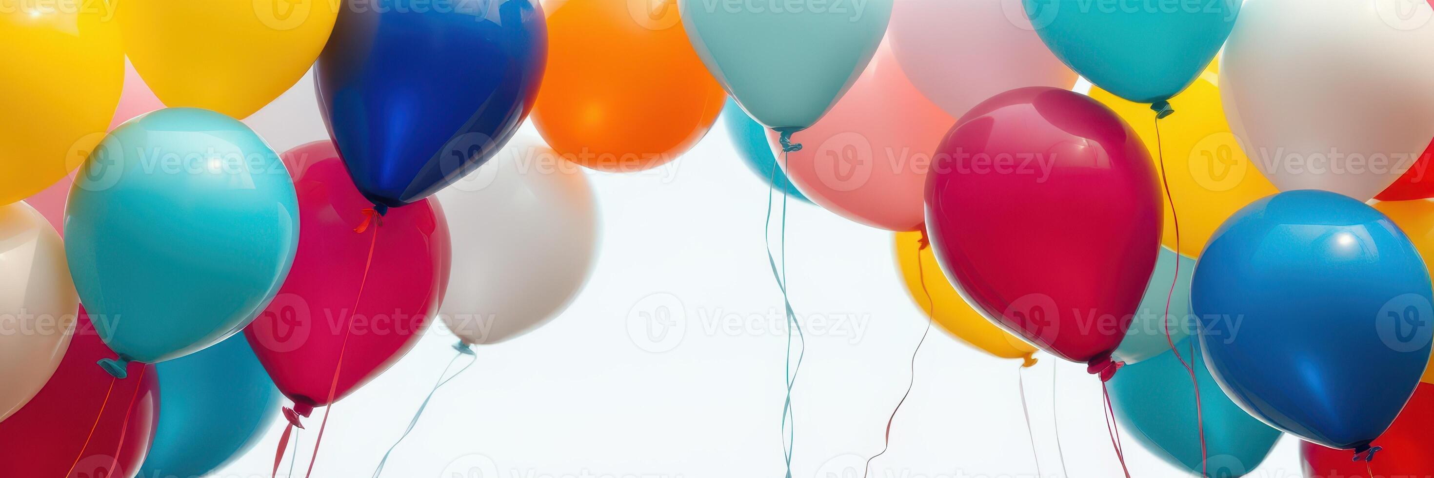 Colorful balloons fill the air during a festive celebration, creating a joyful atmosphere outdoors with bright colors photo
