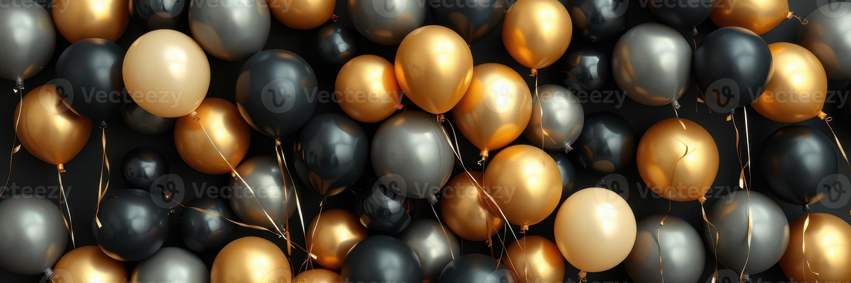 Colorful black, gold, and cream balloons arranged together for a festive celebration or event photo