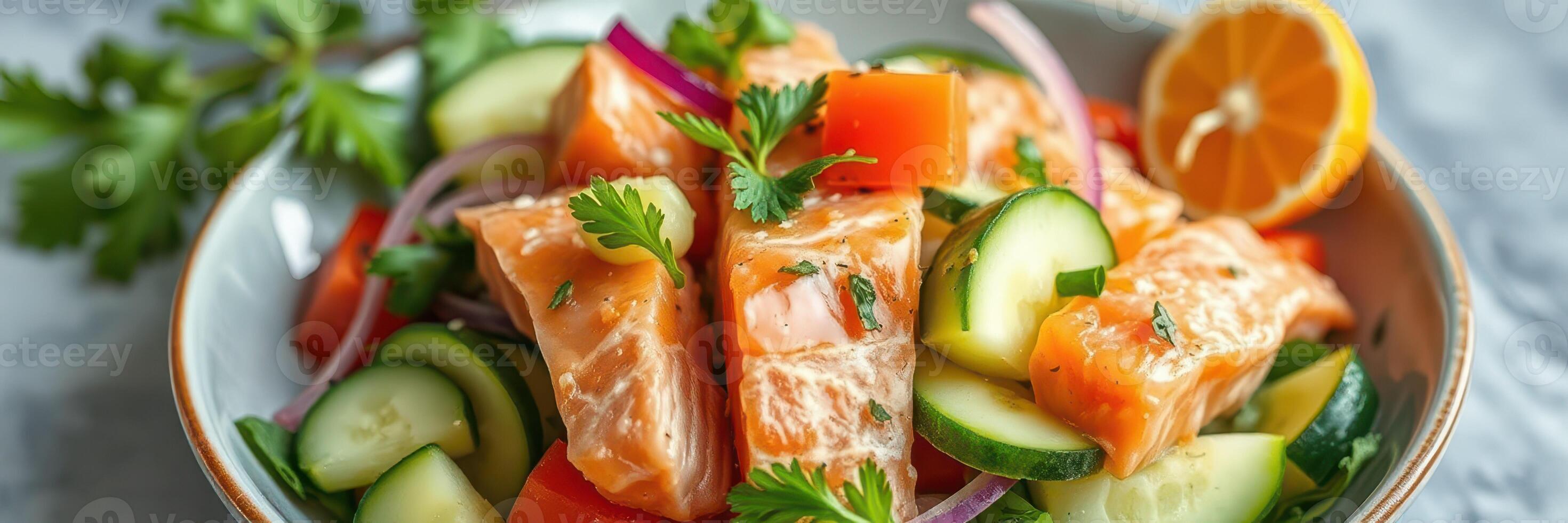 Fresh salmon salad featuring colorful vegetables and citrus served in a bowl on a textured surface photo