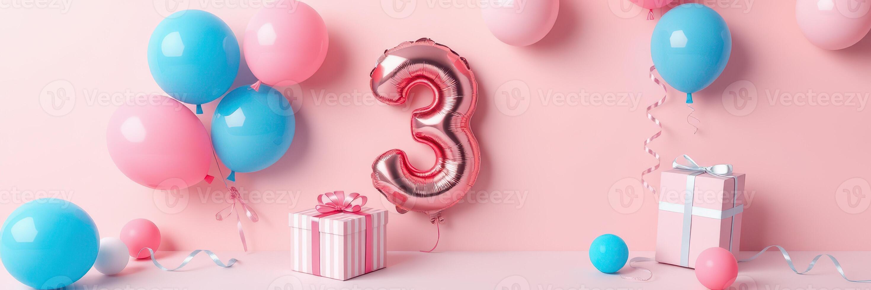 Birthday celebration setup with colorful balloons and presents for a three-year-old child photo