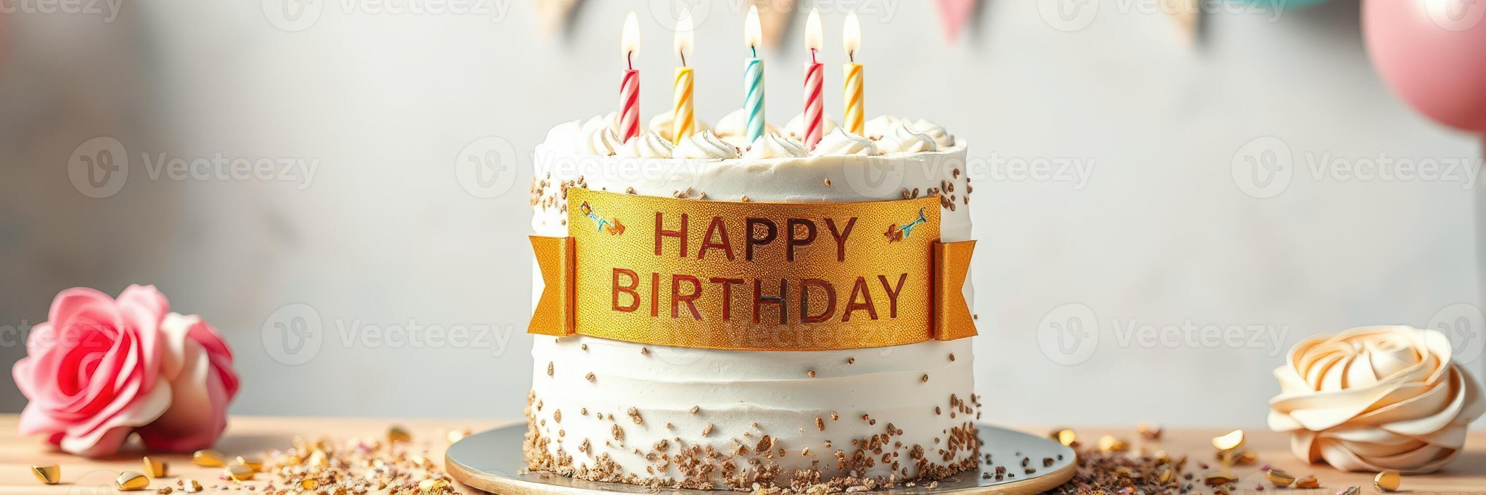 Birthday cake decorated with candles and flowers at a festive celebration gathering photo